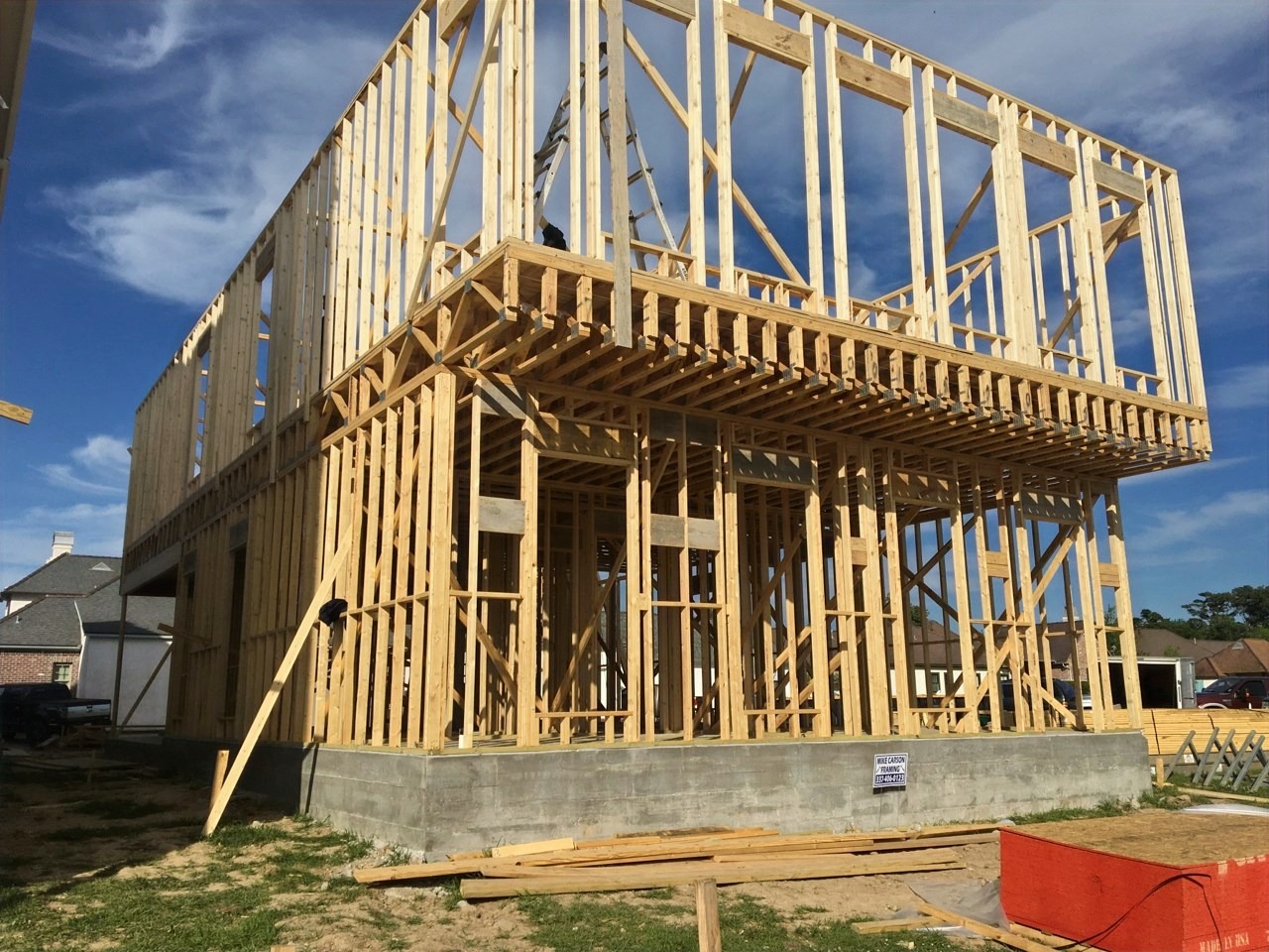 Wood and metal framing on a two-story structure